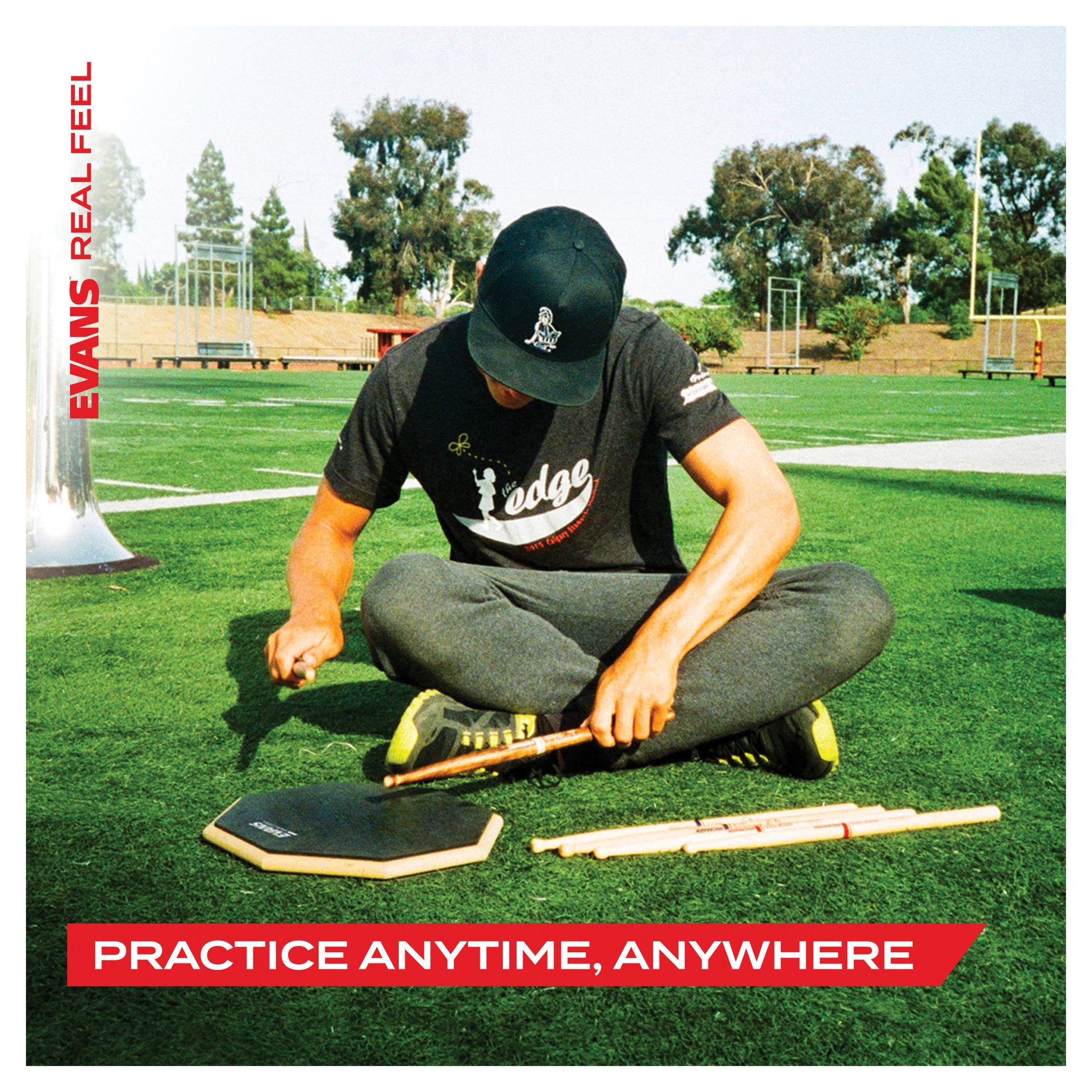 evans realfeel practice pad lifestyle image playing on field